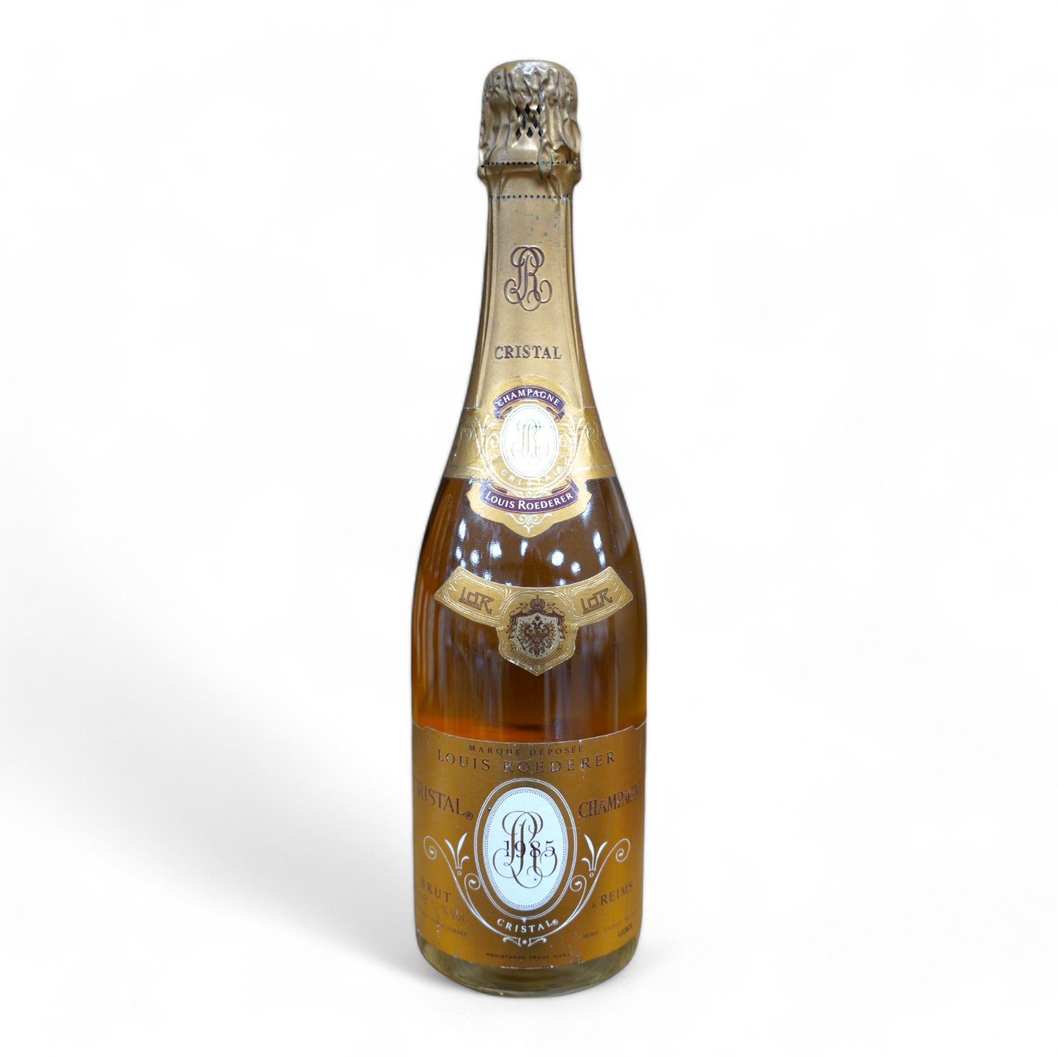 A bottle of Louis Roederer Cristal Champagne, 1985. Condition - good